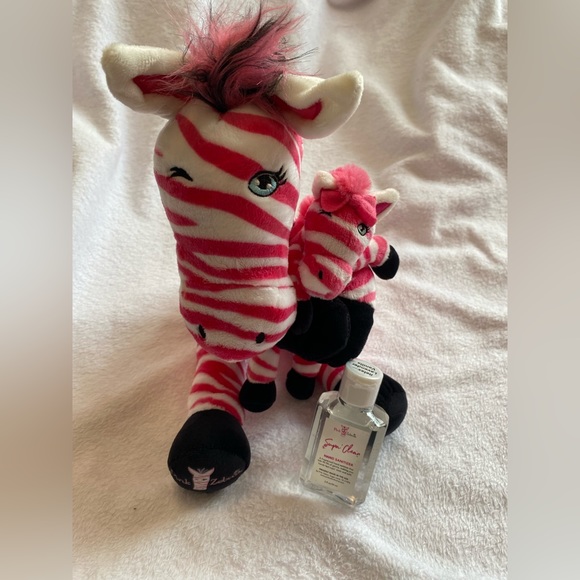 Pink Zebra Other Pink Zebra Plush Holding A Baby Pink Zebra Hand